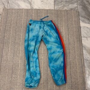 Aviator Nation Blue Tie-Dye Joggers with Red and Orange Stripes